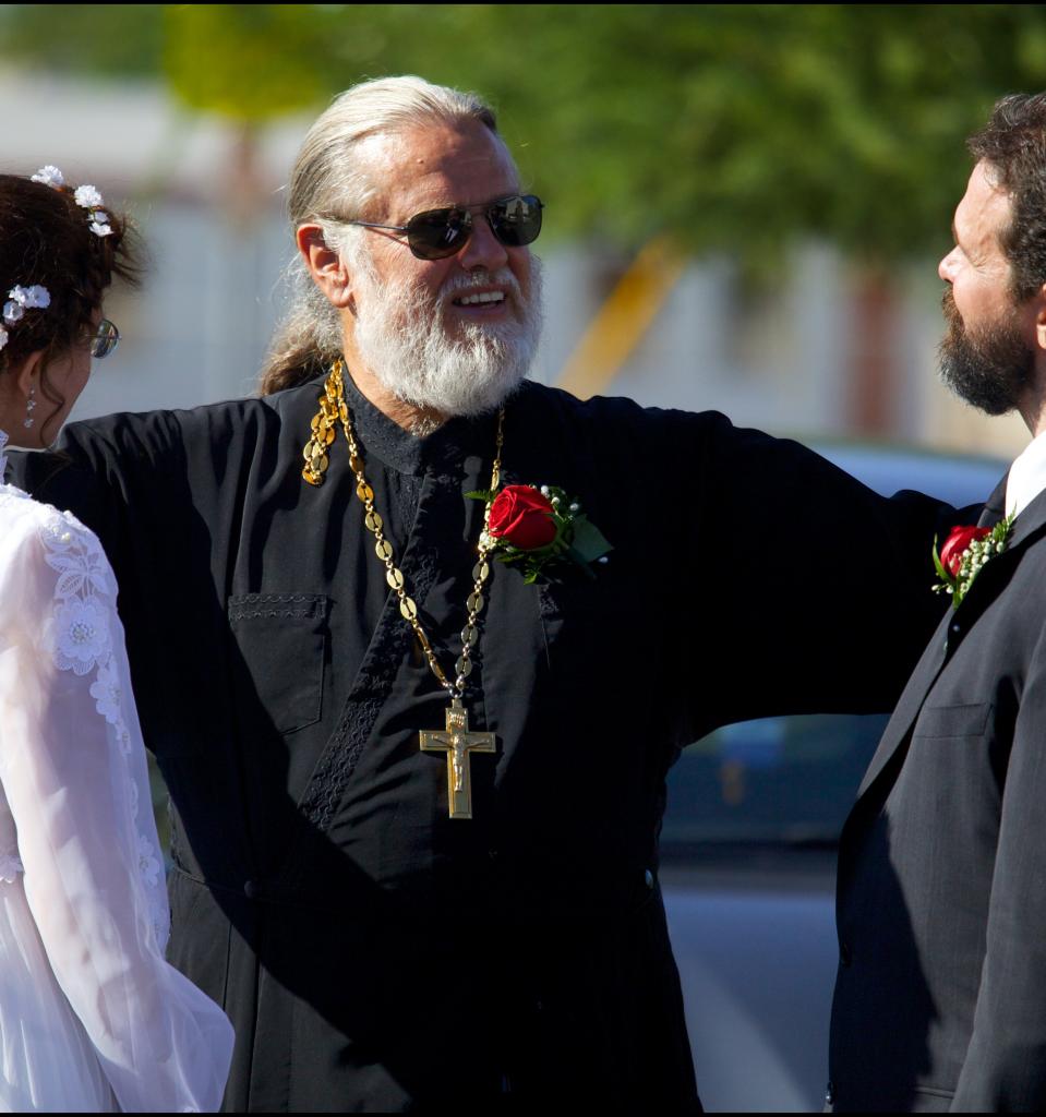 Fr. Damian greeting newly-weds after the Sacrement of Holy Matrimony