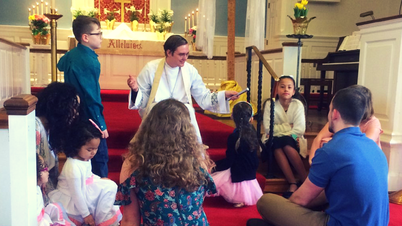 Pastor Joey with the children for Easter Service