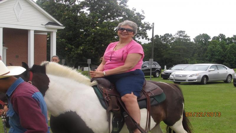 First Lady Ms. Sharon Croom takes a ride