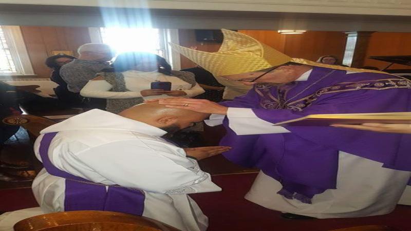 Ordination by Bishop Ken of new servant in ministery